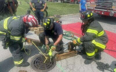 Indianapolis firefighters rescue woman from sewer